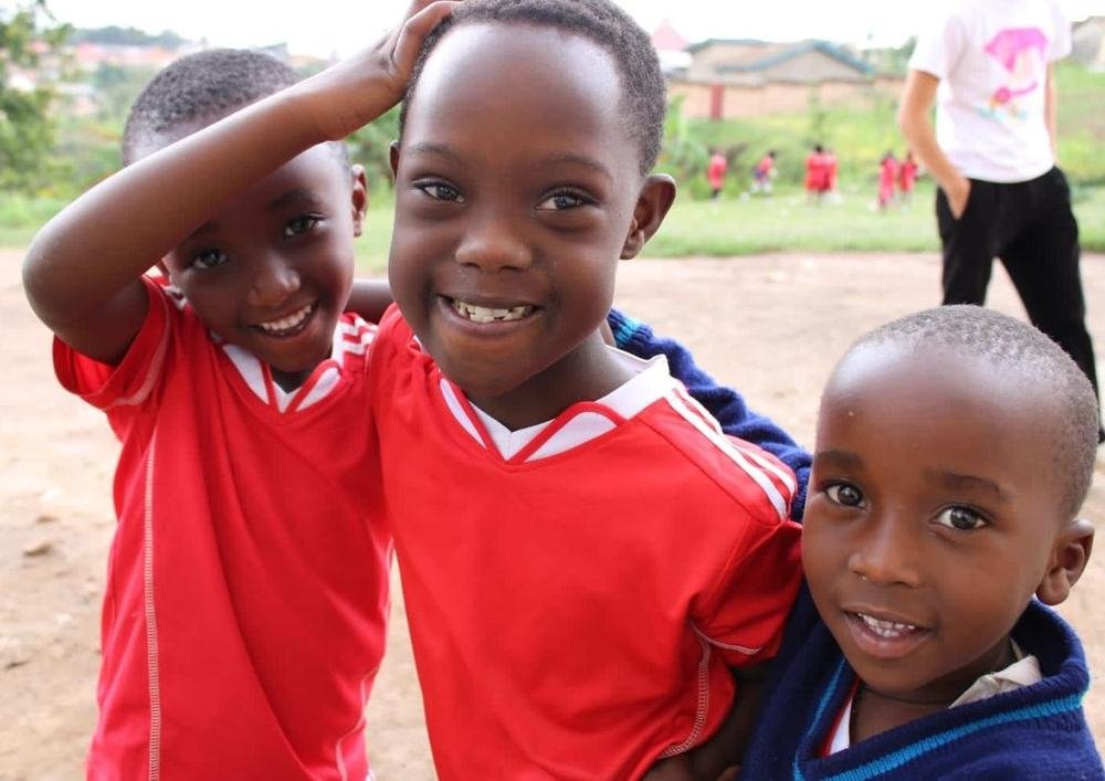 Asher with two classmates at Bright School