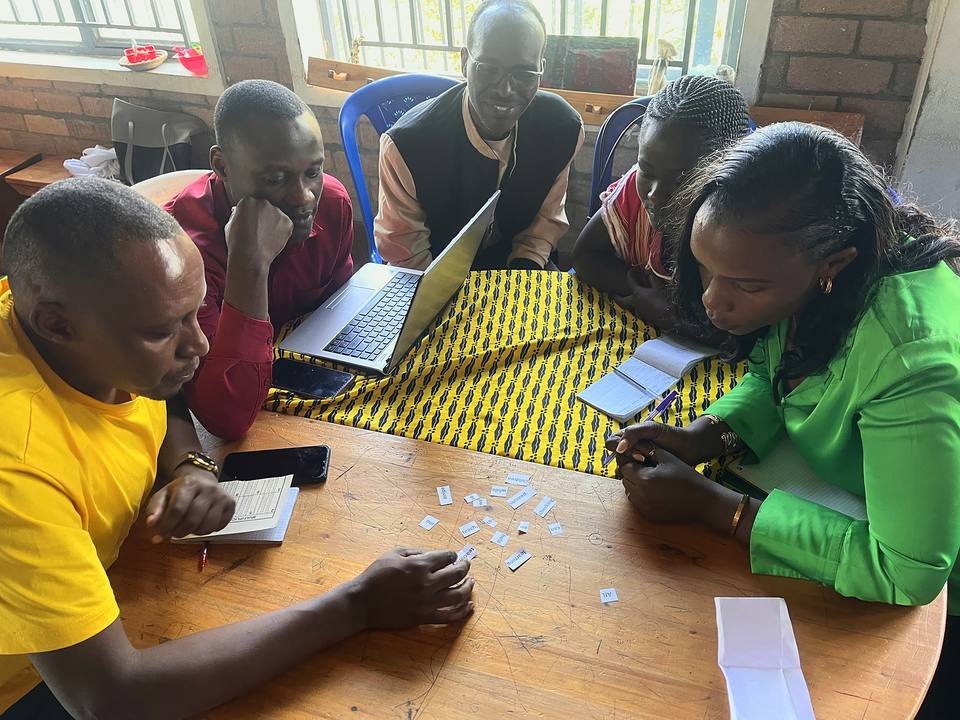 Teachers working together during a partnership workshop